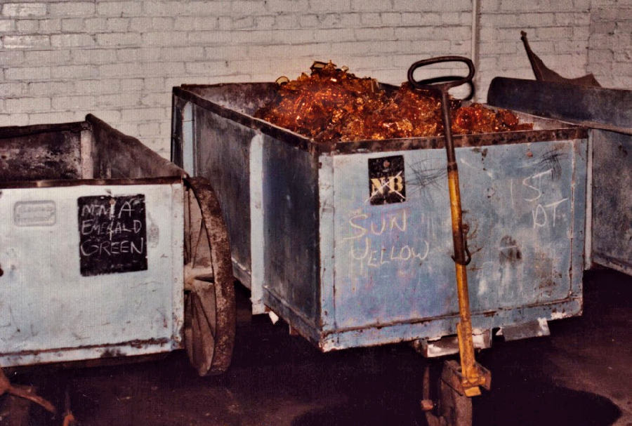 Cullet loaded into trolleys, 1983